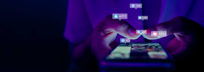 business woman using smartphone ,icons social media fly over showing people engagement connection through social network application platform,Concept viral video and social media marketing