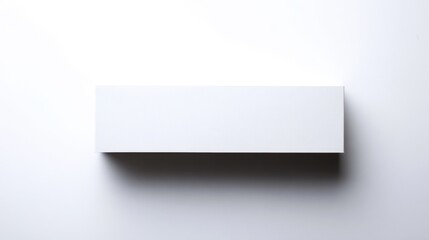 Aufkleber - Minimalist white rectangular box on a plain surface with smooth texture, soft shadow, and monochromatic background, emphasizing simplicity and clean design.