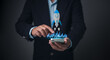 © Thawatchai Images - Businessman launches a holographic rocket from a smartphone, Startup success, innovation, rapid business growth,  technology investment. Digital advancement, entrepreneurship, product launch visuals.