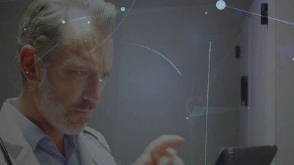 Poster - Male doctor raising tablet and swiping screen, generating medical data visuals for patient analysis