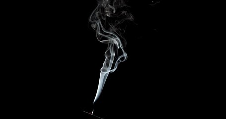Wall Mural - Real smoke on a black background. Thin Flexible Trickle of Real Smoke. Colorful real smoke rises up. Ideal for background or over-layer with blending mode add, screen, lighten.