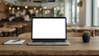 © Md - Laptop with blank screen on wooden table in modern cafe setting