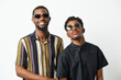 © SHOTPRIME STUDIO - Stylish African American men in trendy sunglasses showcase a confident and fun vibe. Perfect for fashion and friendship themes in lifestyle photography.