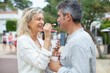 © auremar - happy couple eating ice-cream outdoor