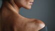 © Marut - Detailed close up of shoulder curve with fresh skin and natural freckles, showing smooth texture and subtle light on bare shoulder, evoking calm and natural beauty
