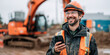 © PhotoStockHub - Cheerful construction worker using phone near excavator.