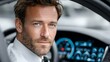 © KN Studio - Confident Man in Luxury Car: A handsome man with a well-groomed beard sits in a modern luxury car, exuding confidence and sophistication.  His gaze is direct.