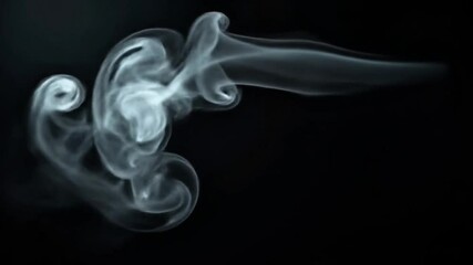 Poster - Elegant wisps of smoke rising and swirling against a dark black background