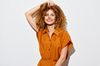 © SHOTPRIME STUDIO - curly hair, smiling woman, portrait, orange outfit, white background, cheerful expression, natural beauty, lifestyle photography, fun mood, feminine style, fresh look, confident pose, casual attire