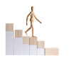 © RifaldiMuhammadSalim - Miniature Figure Ascending Wooden Blocks to Reach Goal