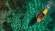 © IndyWingman - Top view close up , a yellow speed boat is sailing in the ocean clear water.