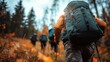 © Larisa AI - A dynamic shot of hikers trekking through an autumn forest, showcasing teamwork and adventure in a vibrant orange and yellow backdrop, celebrating the joy of exploration.