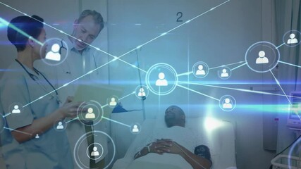 Poster - Physician leaning in while nurse reviewing chart in ward, animating network user icons sharing data