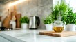 © svastix - A steaming pot of herbal tea placed on a wooden cutting board in a sleek kitchen, embodying wellness, relaxation, and the warmth of home in a contemporary setting.
