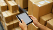 © Сергей Рябуха - Logistics professional checking warehouse stock on digital tablet while standing among stacked boxes logistics worker, warehouse storage, inventory control, supply chain management