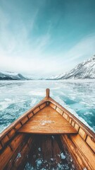 Poster - A wooden boat travels across a frozen lake, perfect for winter scenes and outdoor activities