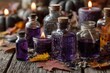 © nurhikmah - Dark purple liquid fills various antique glass bottles, nestled amongst autumn leaves, candles, and stones on a rustic wooden surface, creating a mystical, autumnal ambiance