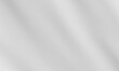 © Yuliya - Abstract light grey defocused background