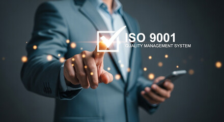 Aufkleber - Man in suit pointing at iso 9001 quality management system with check mark and glowing particles