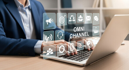 Aufkleber - A person working on a laptop with omni channel icons displayed in the foreground on the screen view