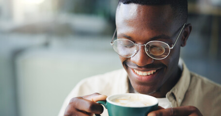 Poster - Happy, coffee and black man in office with break, calm or peaceful reading for creative research. Smile, glasses and African male editor with cappuccino in morning with publishing at agency.