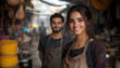 © raffa - Smiling young couple in workshop teamwork and diversity portrait