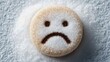 © Sawyer0 - The sad expression in white sugar symbolically reflects the negative impact of excess sugar on health.