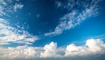 cloudy blue sky with soft and fluffy clouds in natural light