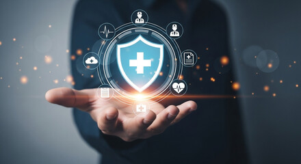 Poster - Person holding a shield with a cross and medical icons floating above their open hand in a dark setting