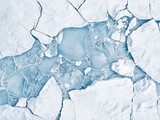 Aerial View of Melting Arctic Pack Ice in Winter, Illustrating the Severe Effects of Climate Change