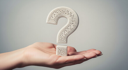 Poster - White question mark with Greek key pattern, delicately held in a hand, representing inquiry, curiosity, or seeking answers