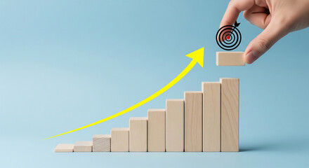 Poster - Wooden blocks forming an ascending graph, hand placing a target atop, illustrating growth and achievement, symbolizing progress and success