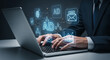 © mod - Person typing on laptop with digital marketing icons overlaying the screen and hands visible