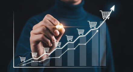 Poster - Person drawing an upward trending graph with shopping carts on a dark background for e commerce