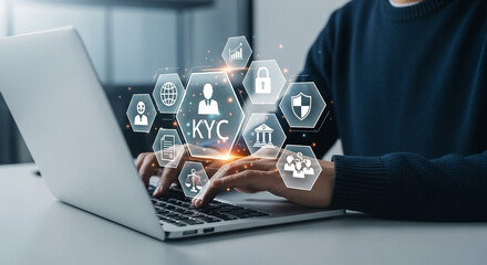 Poster - Person typing on a laptop with kyc and security icons displayed above the keyboard in a digital overlay