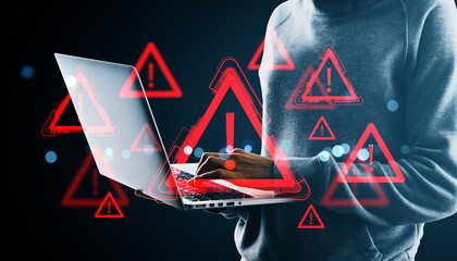 Poster - Hacker in hoodie using laptop with red warning icons, symbolizing cyber threats and data danger in digital network background concept.