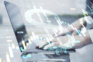 Poster - Businessman analyzing forex market data on laptop with digital dollar symbol and financial charts overlay on office desk background.