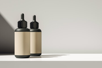 Poster - Two black dropper bottles with blank beige labels standing on white surface against soft gradient wall in sunlight and shadow for product mockup. 3D Rendering