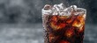 © TommyNa - Close up of cold cola in a glass with ice cubes and dense condensation, against a misty background, perfect for beverage advertising, soda branding, or refreshing summer drink promotions