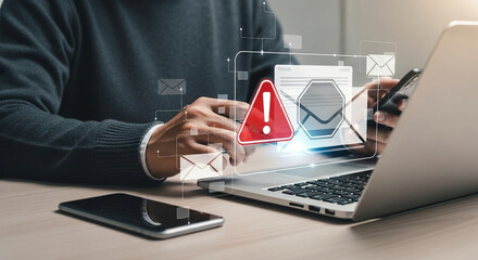 Poster - Person using laptop and phone with warning sign and email icons overlayed on the screen image