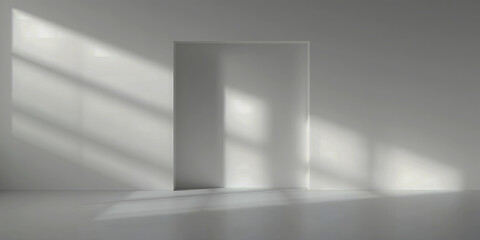 Poster - A minimalist studio setup featuring a white cube bathed in soft light and shadow patterns on walls