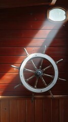 Poster - Detailed Ship Wheel Mounted on Wooden Wall Illuminated by Soft Morning Light