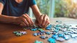 © Lejie - Senior woman engaging in puzzle-solving on wooden table for cognitive health, promoting dementia prevention. Soft natural light, intimate setting with shallow depth of field