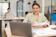 © David - Shot of a asian business female working on laptop computer in her workstation.Portrait of Business people employee freelance online marketing e-commerce telemarketing concept.