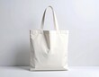 © lalala - Minimalist white tote bag with subtle shadows against a neutral backdrop