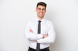 © luismolinero - Business caucasian man isolated on white background keeping the arms crossed in frontal position