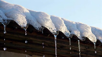 Wall Mural - arafed roof with icicles of snow and icicles hanging from it