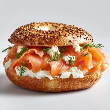 Fresh Bagel with Cream Cheese and Smoked Salmon Topping. Isolated on transparent background