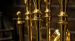 © kenzo - Gleaming Gold Fireplace Tool Set: A Luxurious Home Accent