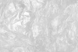 Textura de bolsa plástica color blanco. White plastic film wrap texture background. White wrinkled plastic bag texture